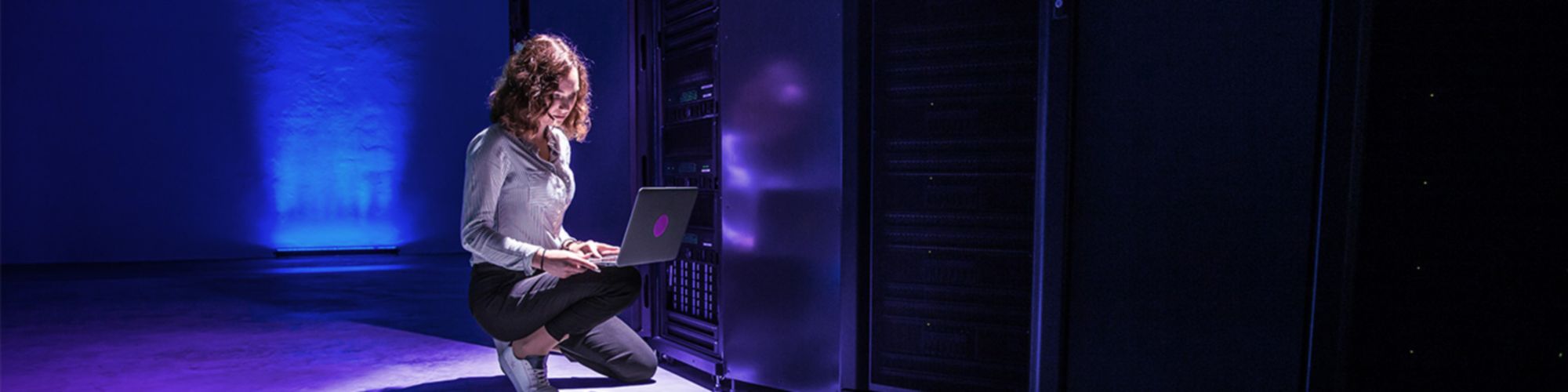 Person sitting down with computer