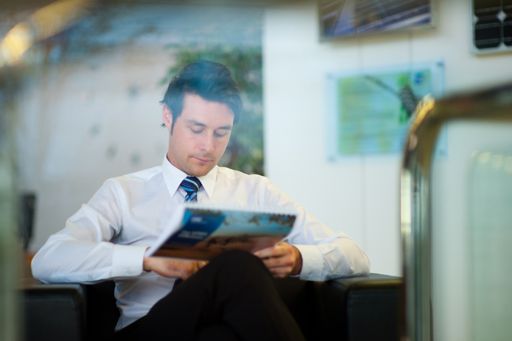 Businessman reading a brochure