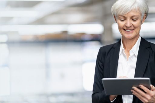 lady-in-a-suit-holding-a-tablet