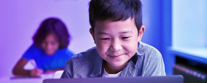 Little boy using laptop