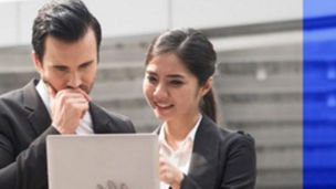  People looking at a laptop