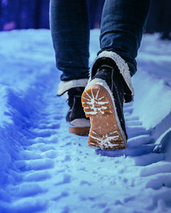 man-walking-on-snow